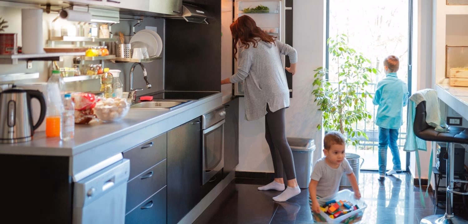 A busy mom and her kids in their kitchen in Minneapolis, MN