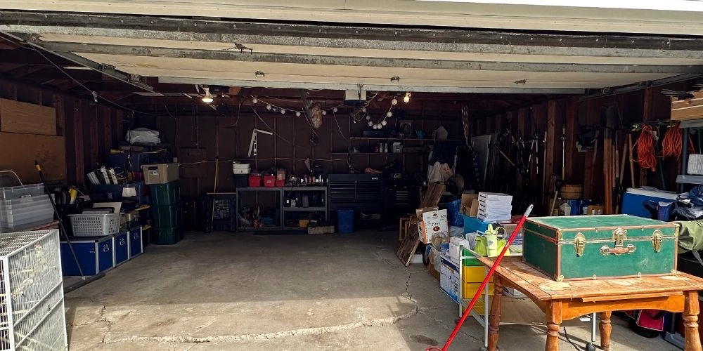 A garage near Minneapolis, MN that is being cleaned and organized by Keepsake PCO.